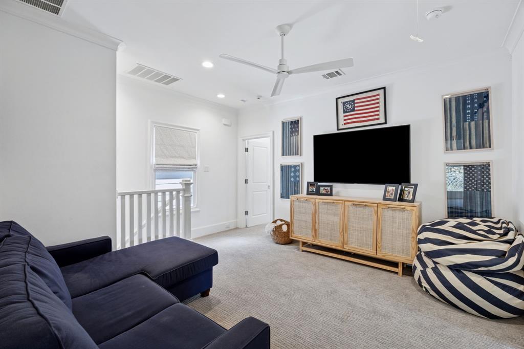13450 Shumate Way Malakoff, TX 75148 - Photo 21 of 40 a living room with furniture and a flat screen tv