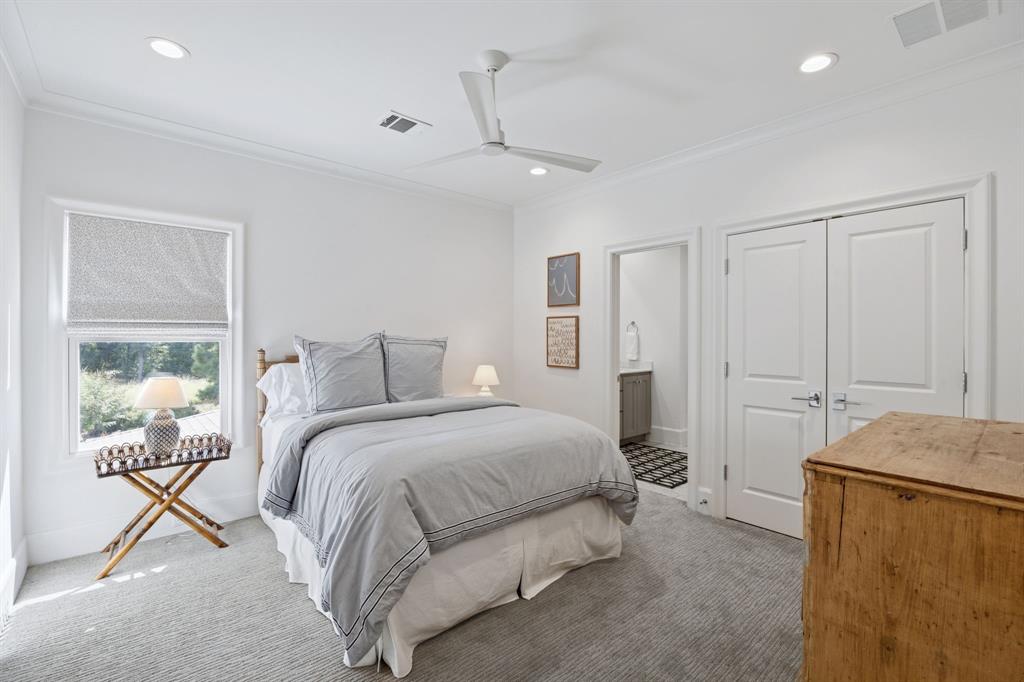 13450 Shumate Way Malakoff, TX 75148 - Photo 29 of 40 a spacious bedroom with a bed and a table