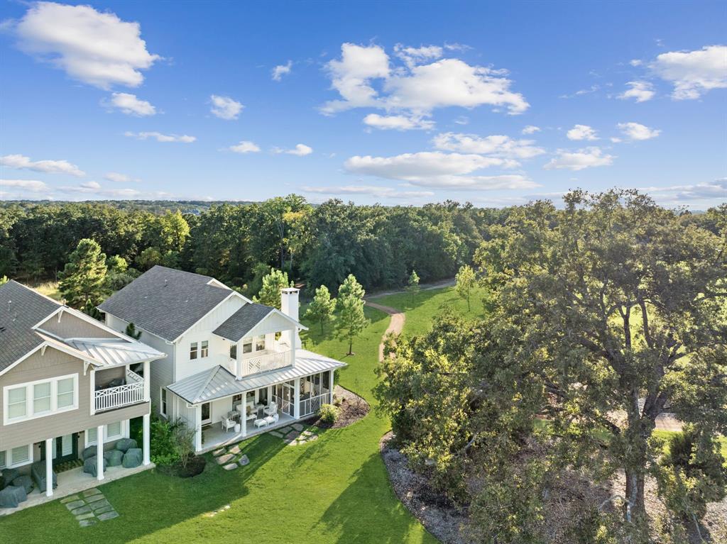 13450 Shumate Way Malakoff, TX 75148 - Photo 34 of 40 a aerial view of a house with a big yard and large trees