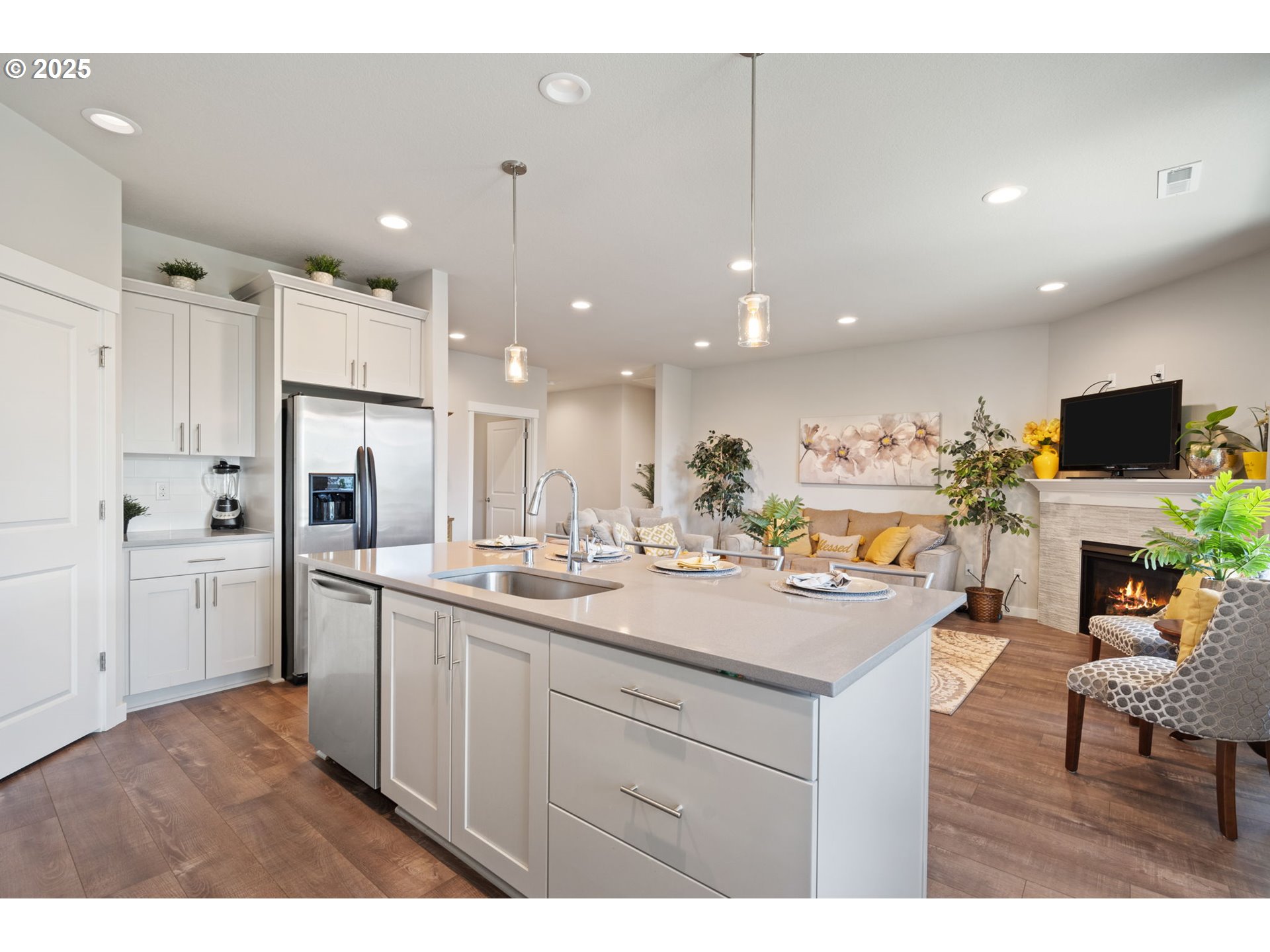 8707 North 1st Street Ridgefield, WA 98642 - Photo 14 of 40 a kitchen with a sink and cabinets