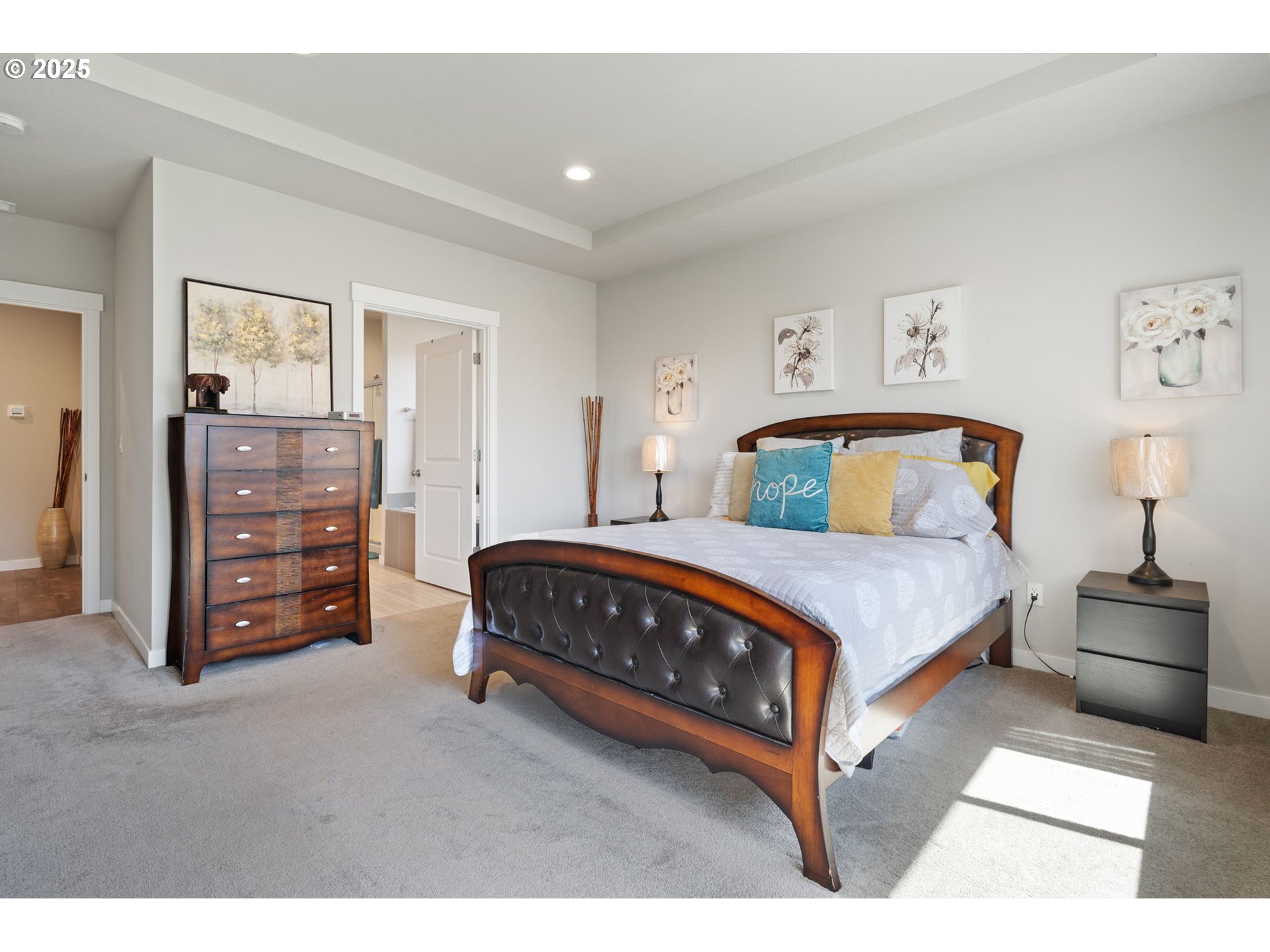 8707 North 1st Street Ridgefield, WA 98642 - Photo 20 of 40 a bedroom with a bed and furniture