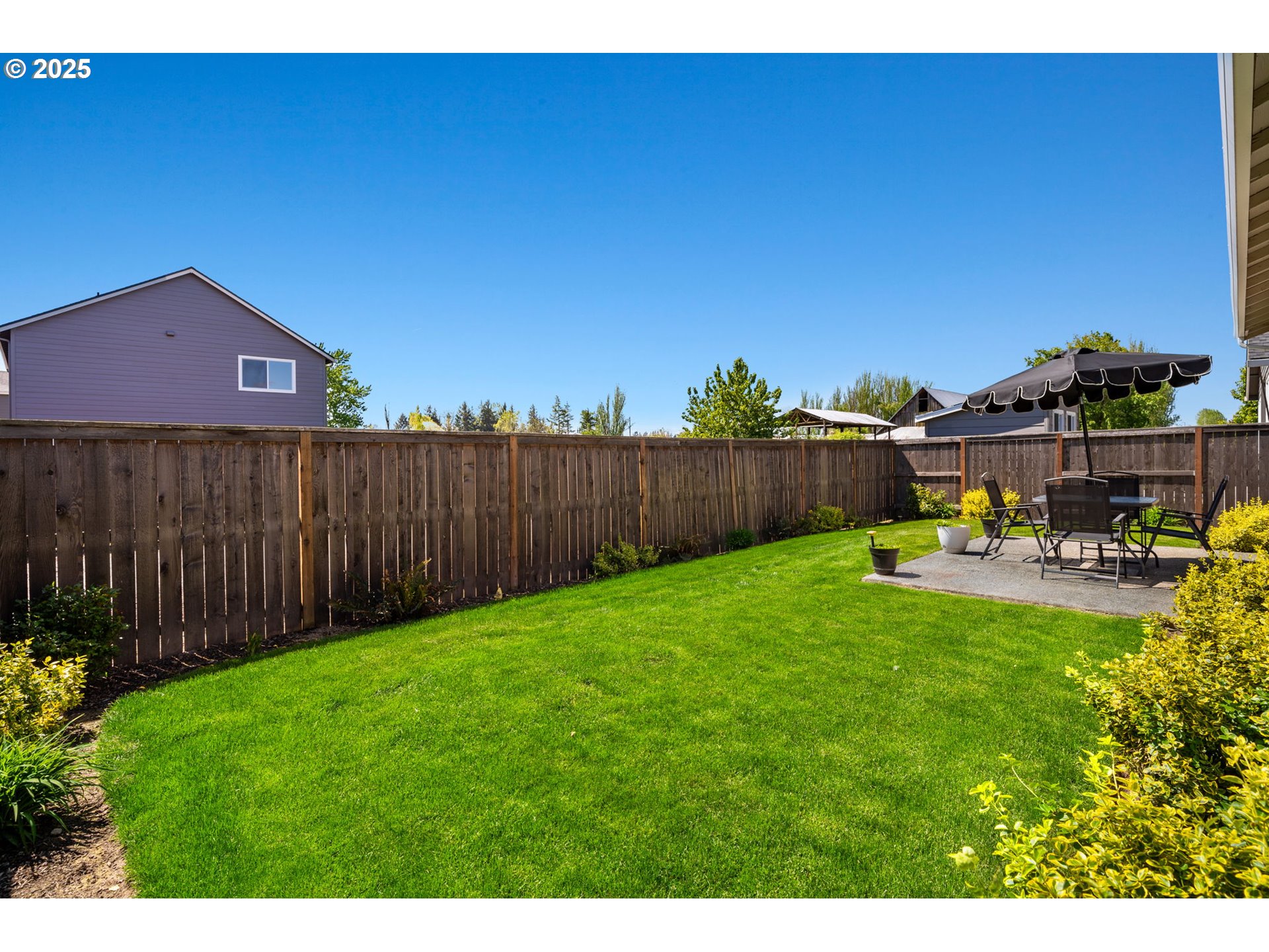 8707 North 1st Street Ridgefield, WA 98642 - Photo 29 of 40 a view of a backyard with sitting area