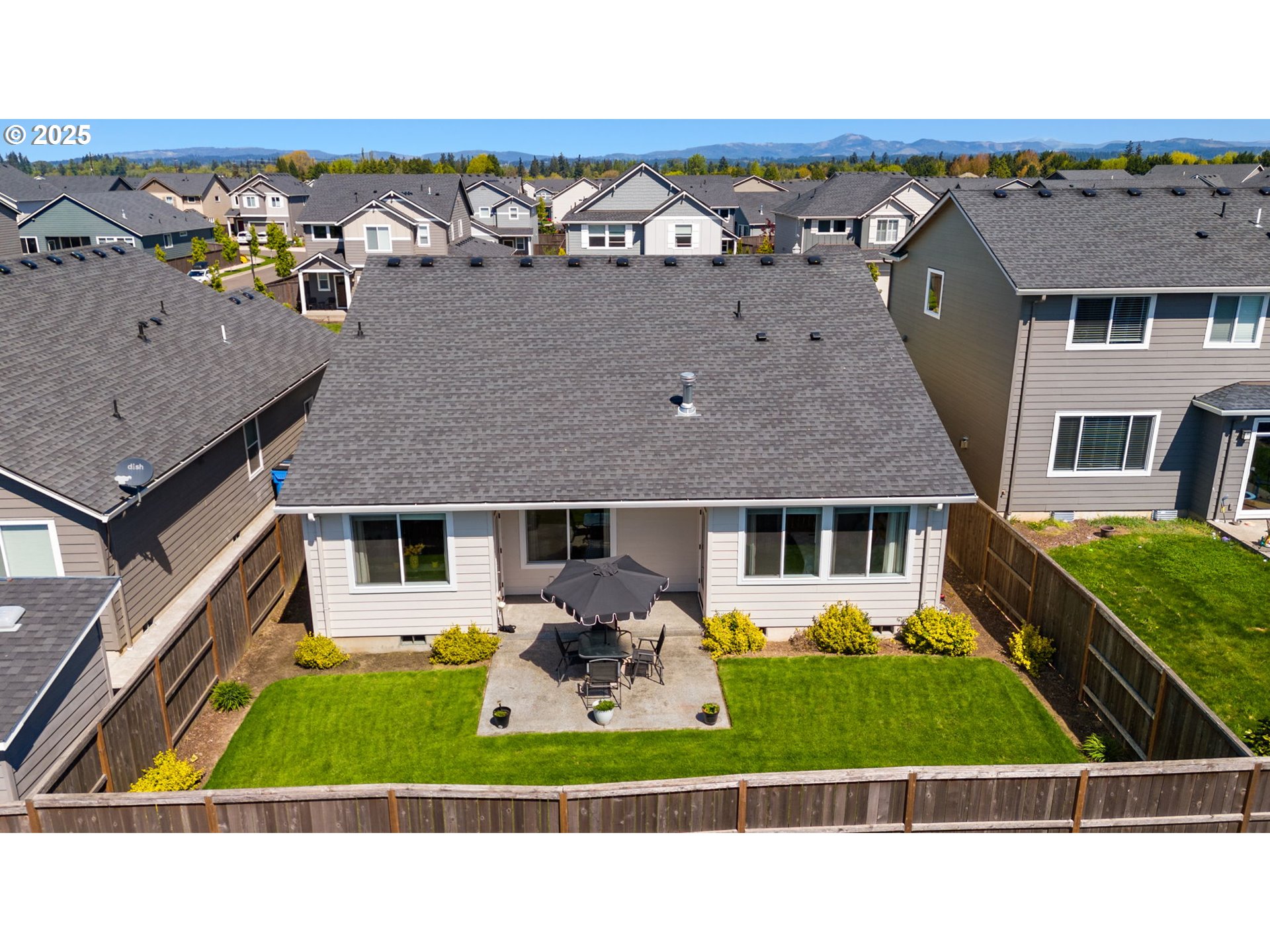 8707 North 1st Street Ridgefield, WA 98642 - Photo 30 of 40 a picture of a building with yard and outdoor seating