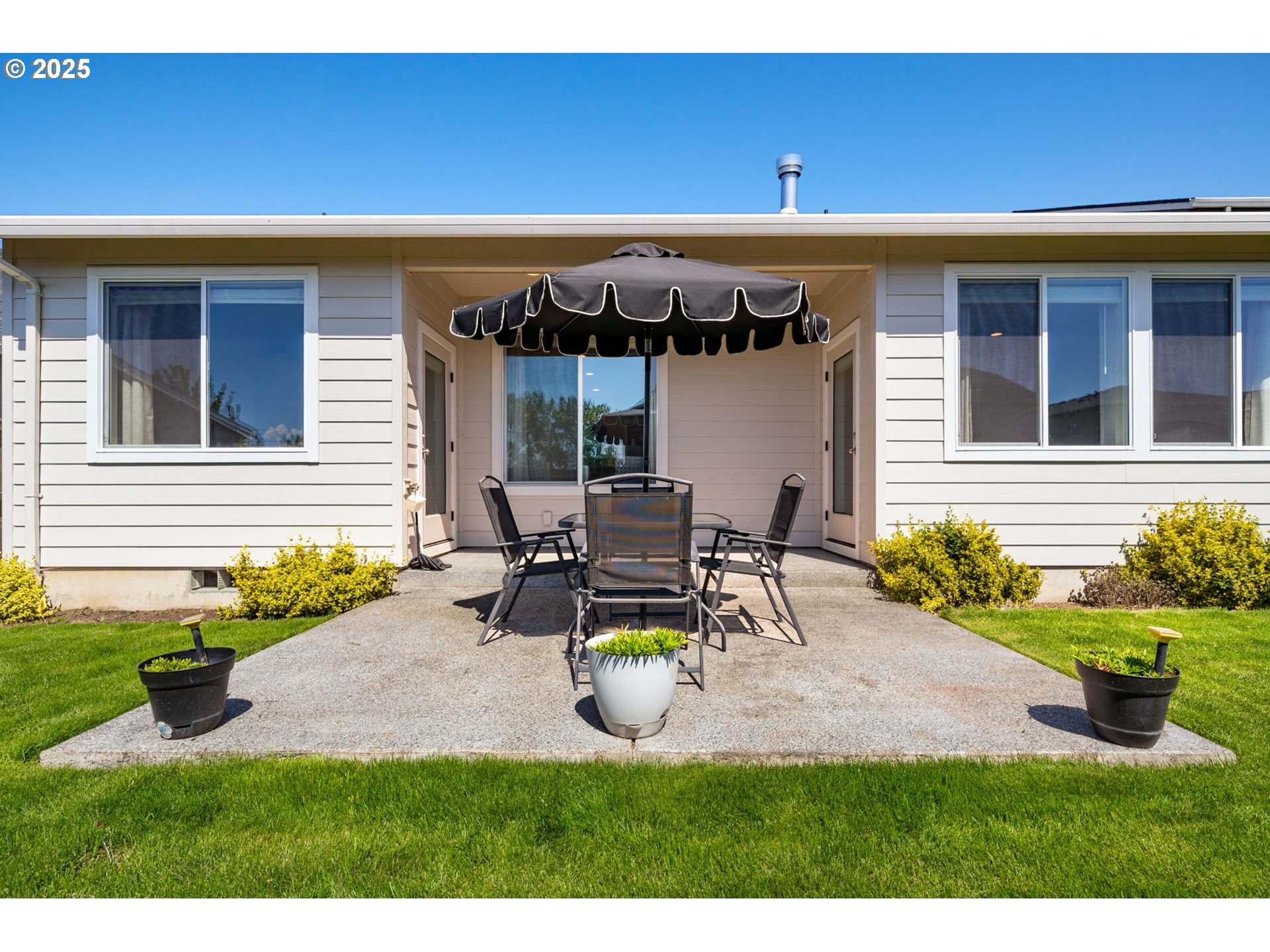 8707 North 1st Street Ridgefield, WA 98642 - Photo 33 of 40 a view of an outdoor kitchen with seating area