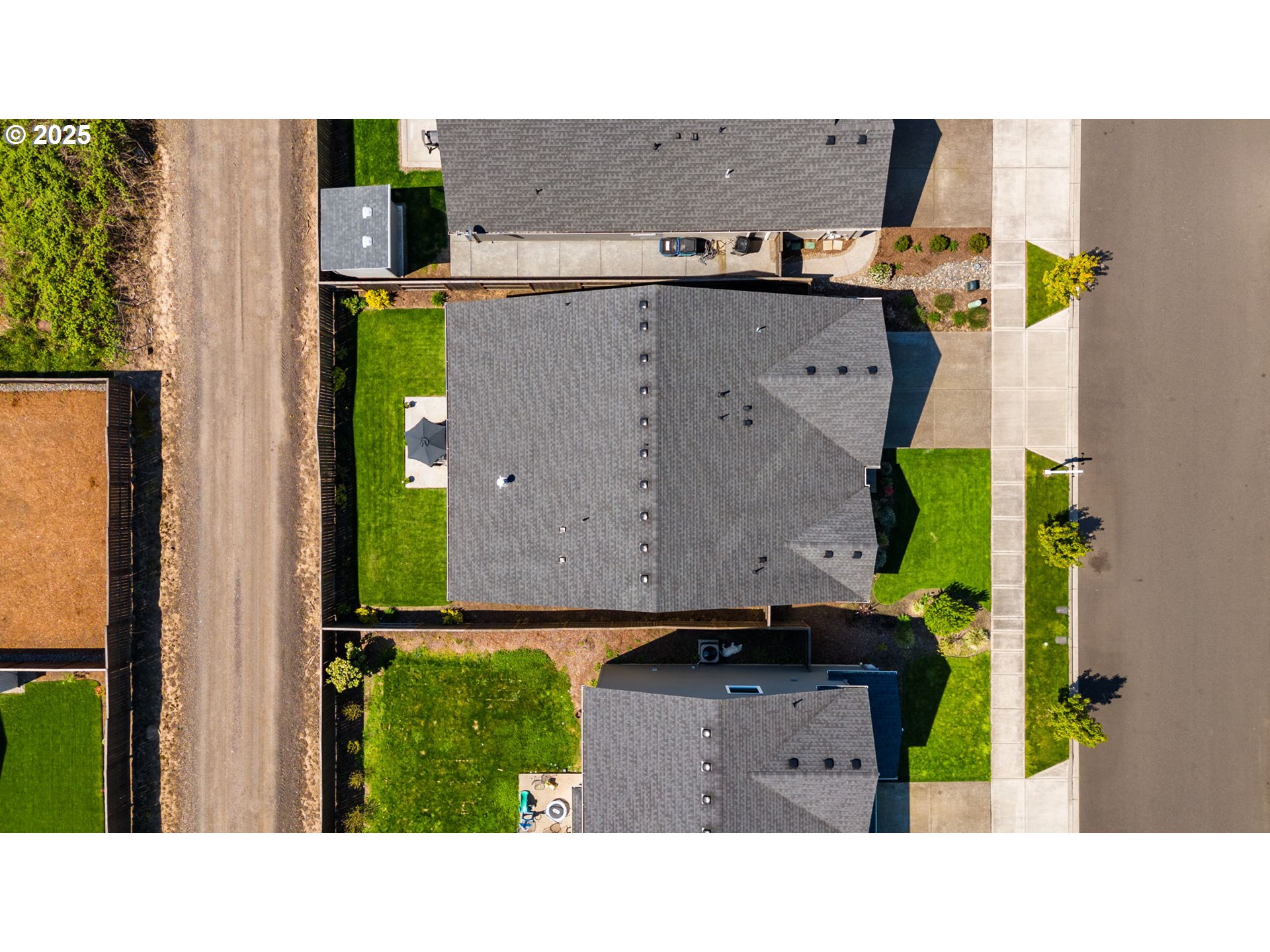8707 North 1st Street Ridgefield, WA 98642 - Photo 37 of 40 an aerial view of a house with a yard