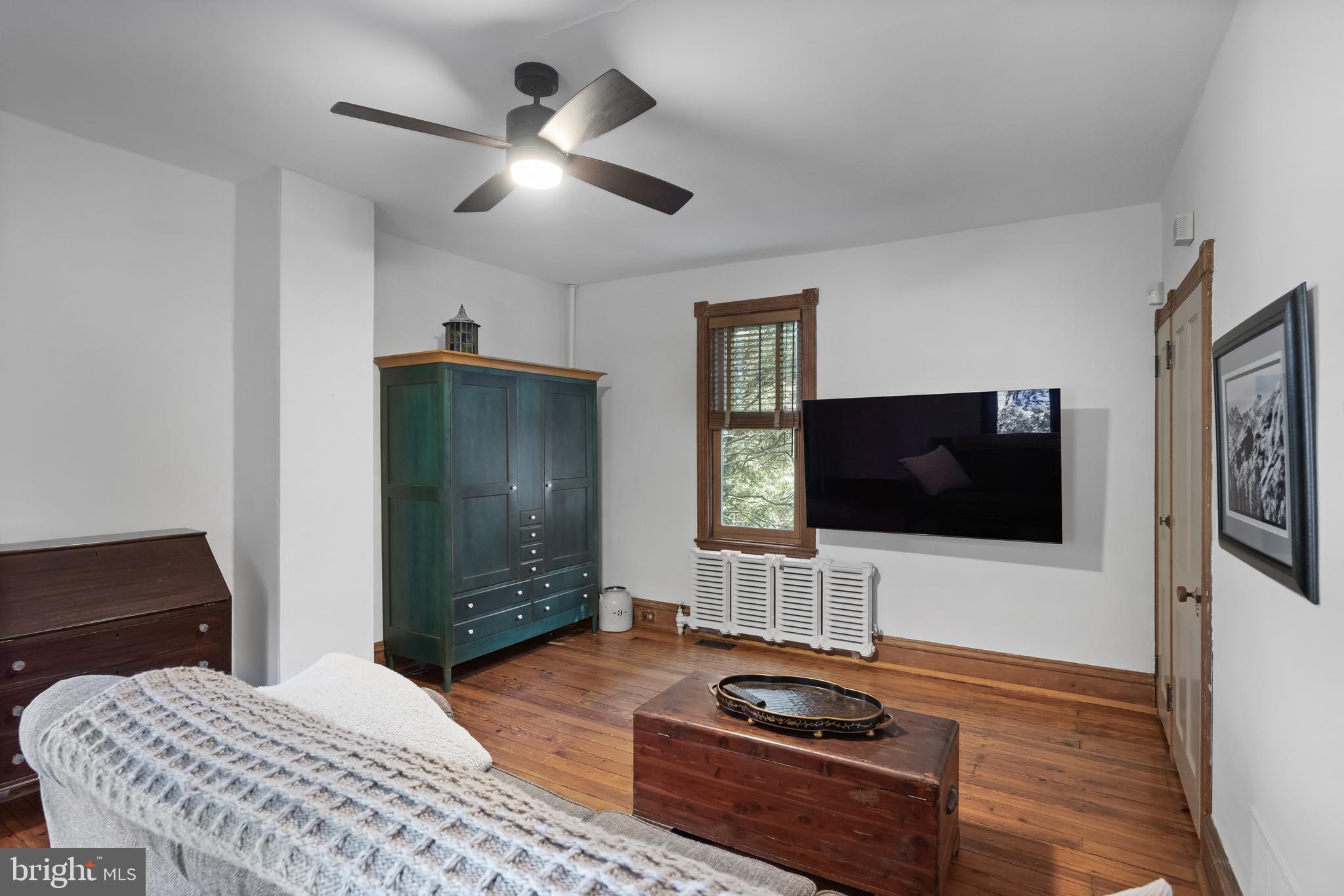 269 East 3rd Street Moorestown, NJ 08057 - Photo 12 of 52 a bedroom with furniture and a flat screen tv