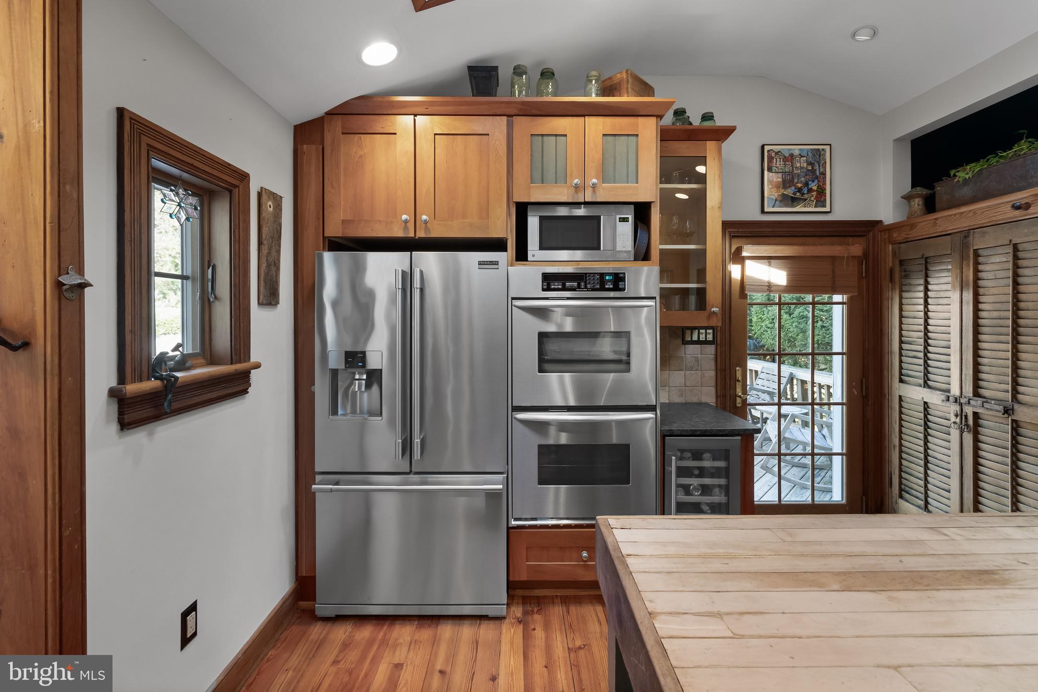 269 East 3rd Street Moorestown, NJ 08057 - Photo 16 of 52 a kitchen with stainless steel appliances a refrigerator and a stove top oven