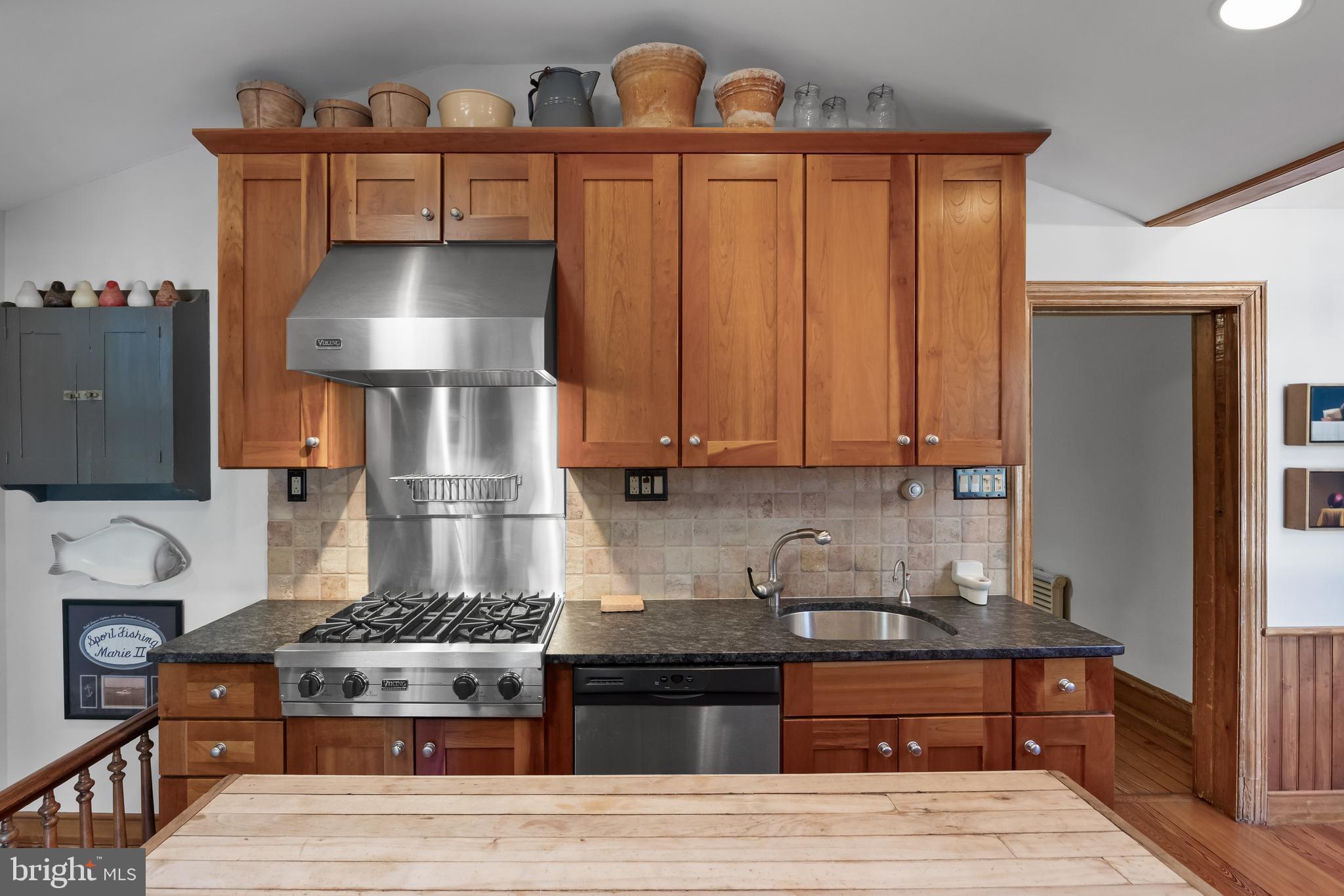 269 East 3rd Street Moorestown, NJ 08057 - Photo 18 of 52 a kitchen with stainless steel appliances granite countertop a stove a sink and a refrigerator