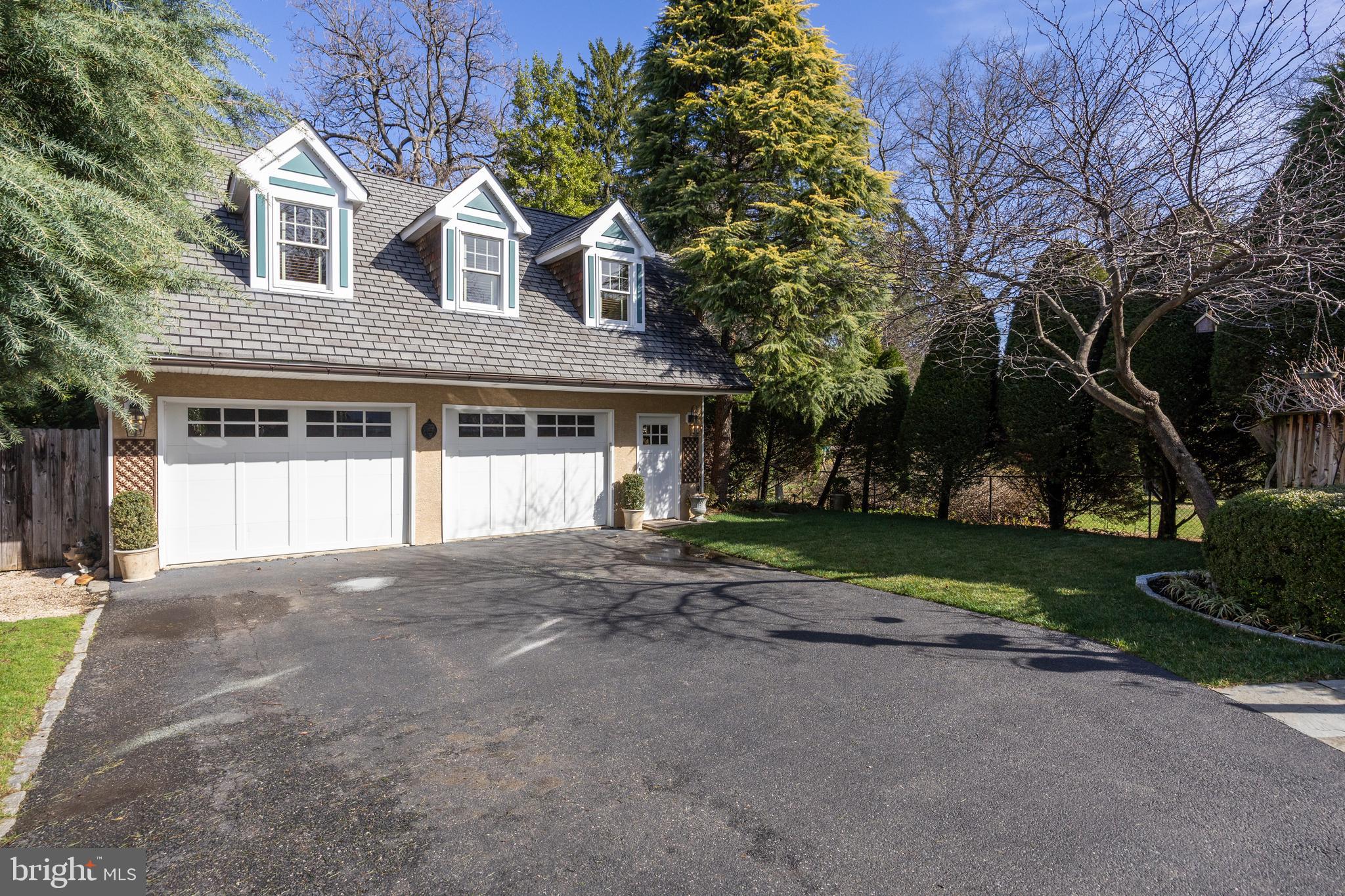 269 East 3rd Street Moorestown, NJ 08057 - Photo 36 of 52 a front view of a house with a yard and garage