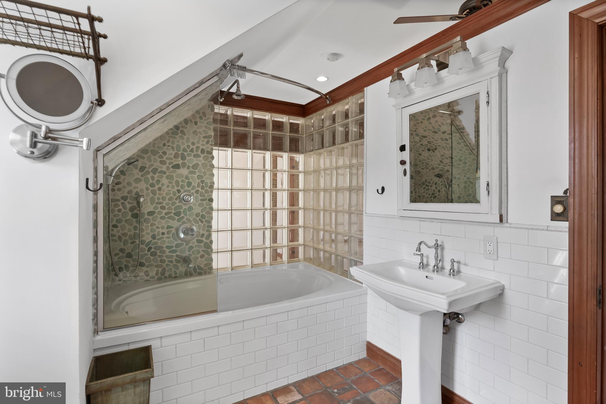 269 East 3rd Street Moorestown, NJ 08057 - Photo 41 of 52 a bathroom with a sink mirror bathtub and shower