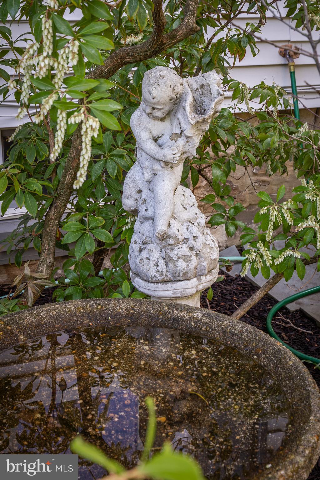 269 East 3rd Street Moorestown, NJ 08057 - Photo 43 of 52 a view of a garden with a fountain