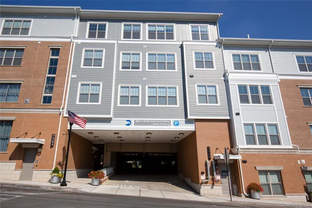 a view of a street with seating space