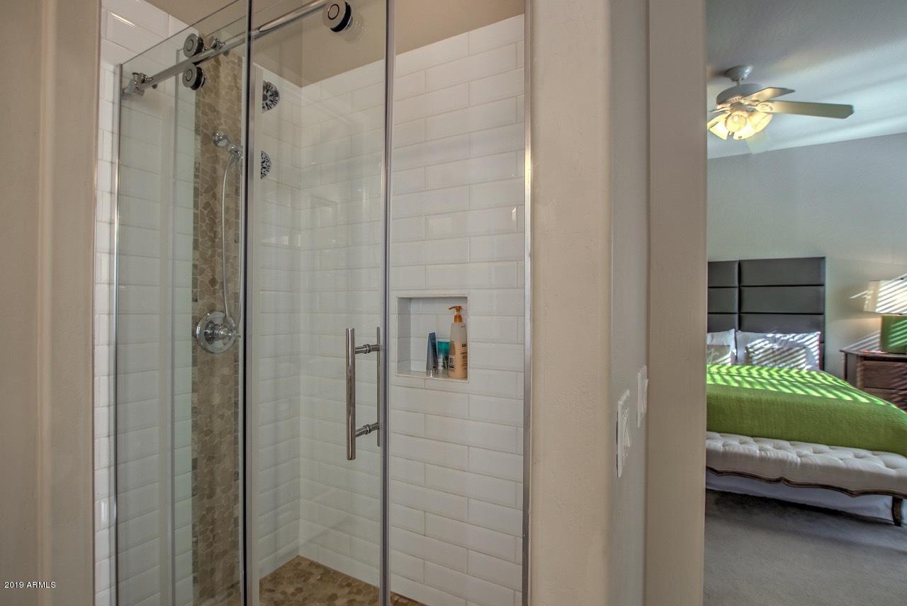 3977 East Hashknife Road Phoenix, AZ 85050 - Photo 17 of 28 a bathroom with a shower