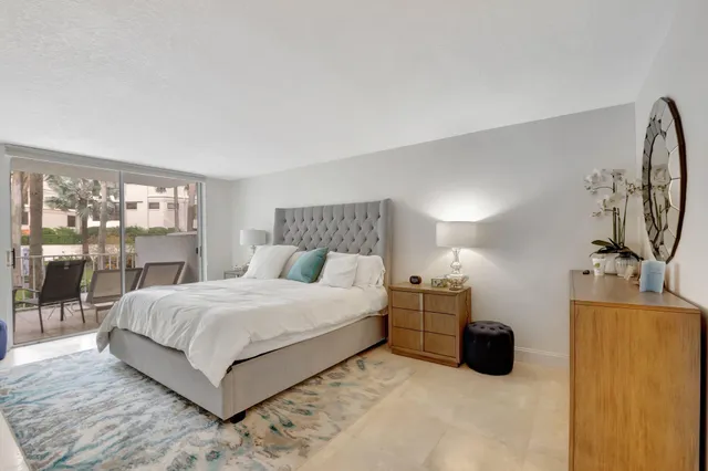 a bathroom with a double vanity sink and mirror