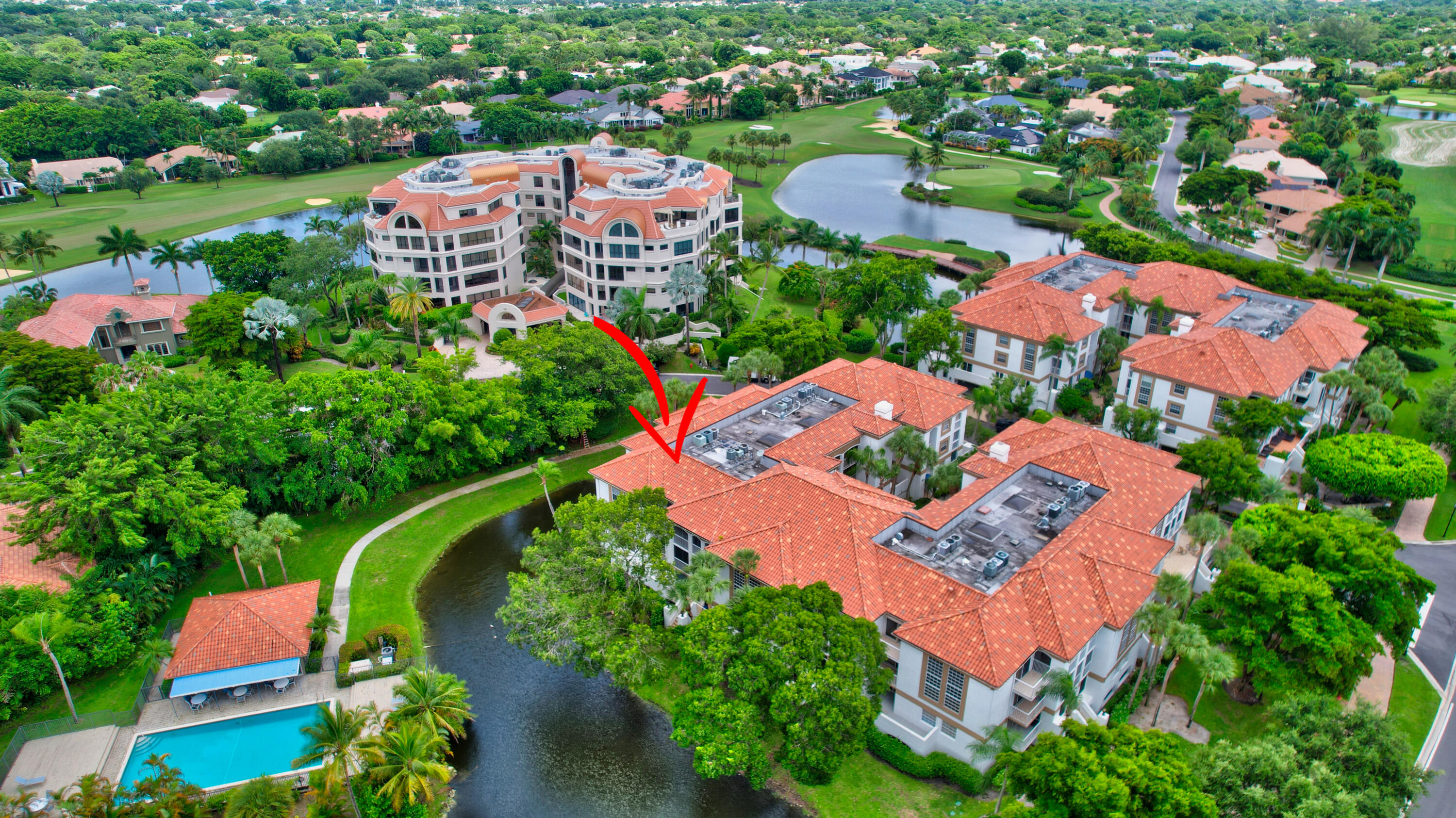 7370 Orangewood Lane, Unit 107 Boca Raton, FL 33433 - Photo 36 of 78 an aerial view of a house with a garden and swimming pool