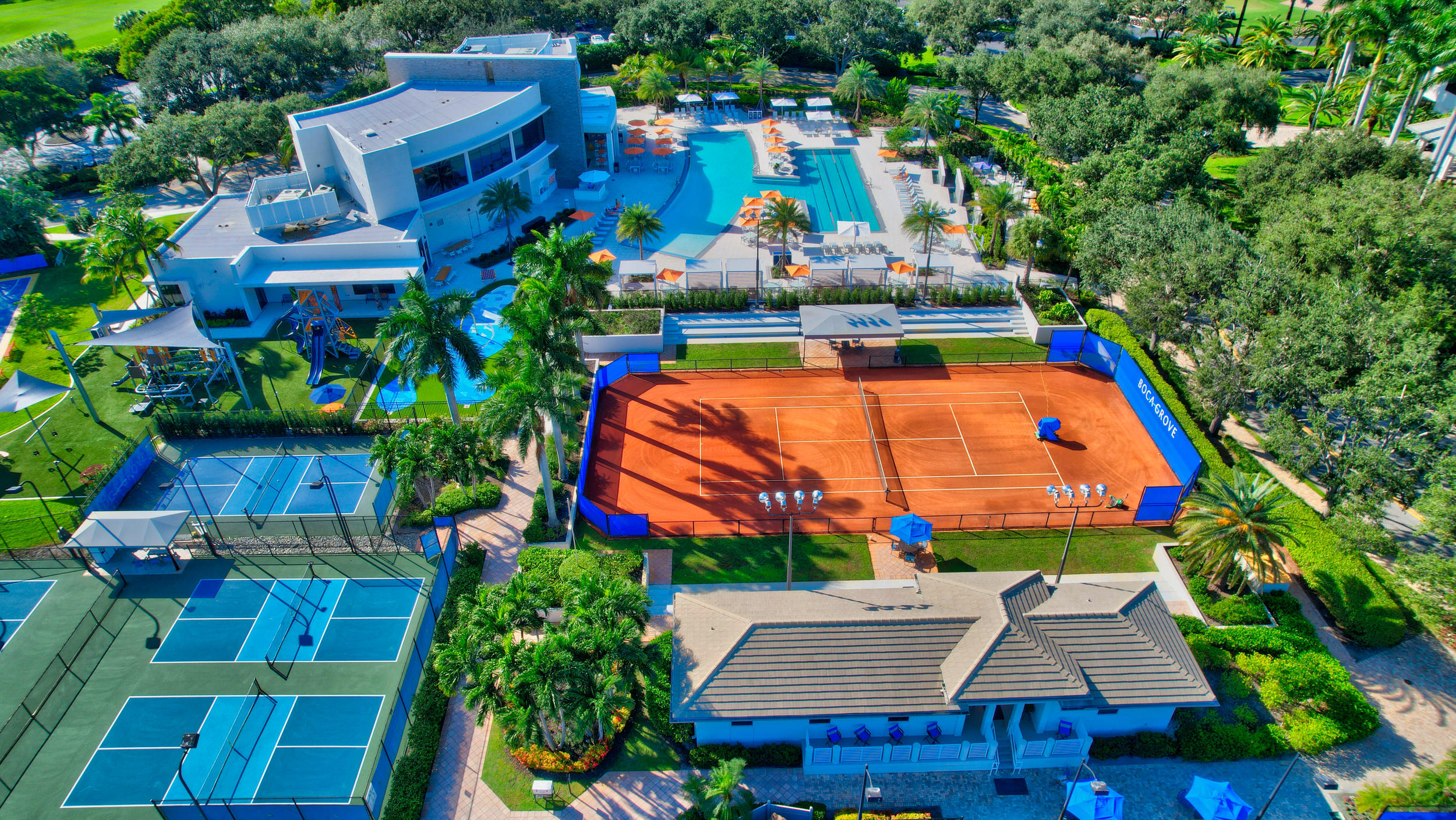 7370 Orangewood Lane, Unit 107 Boca Raton, FL 33433 - Photo 43 of 78 an aerial view of a house with a yard and balcony