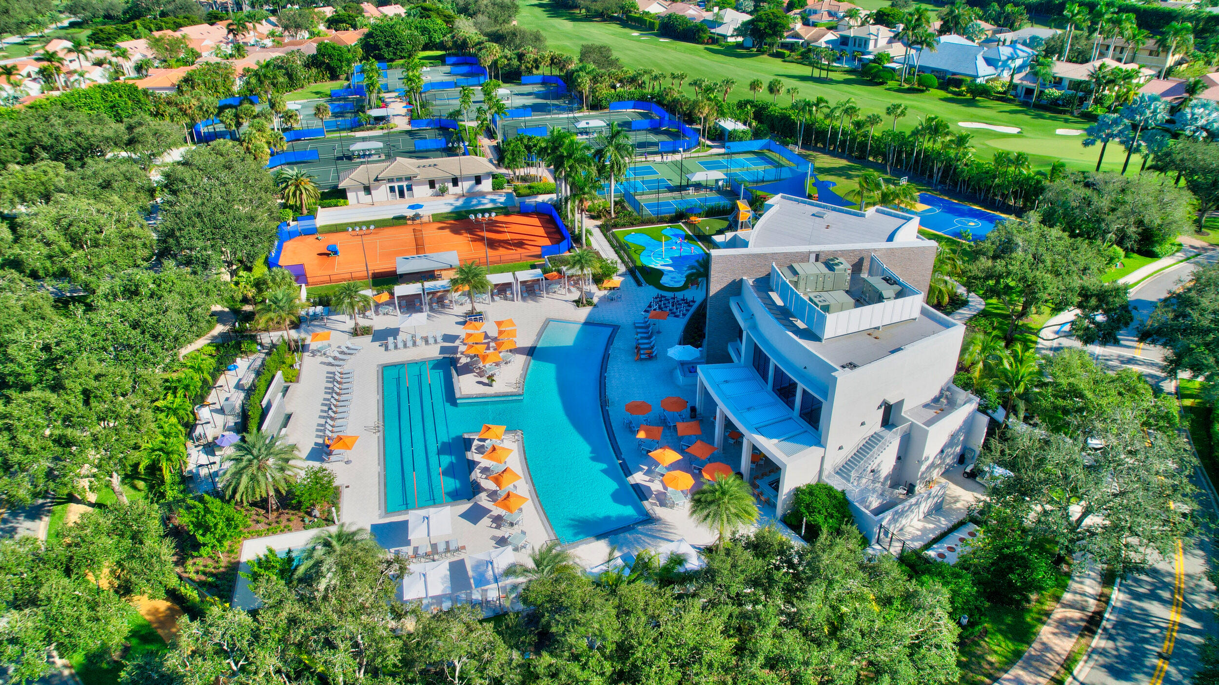 7370 Orangewood Lane, Unit 107 Boca Raton, FL 33433 - Photo 47 of 78 an aerial view of a house with a yard and swimming pool