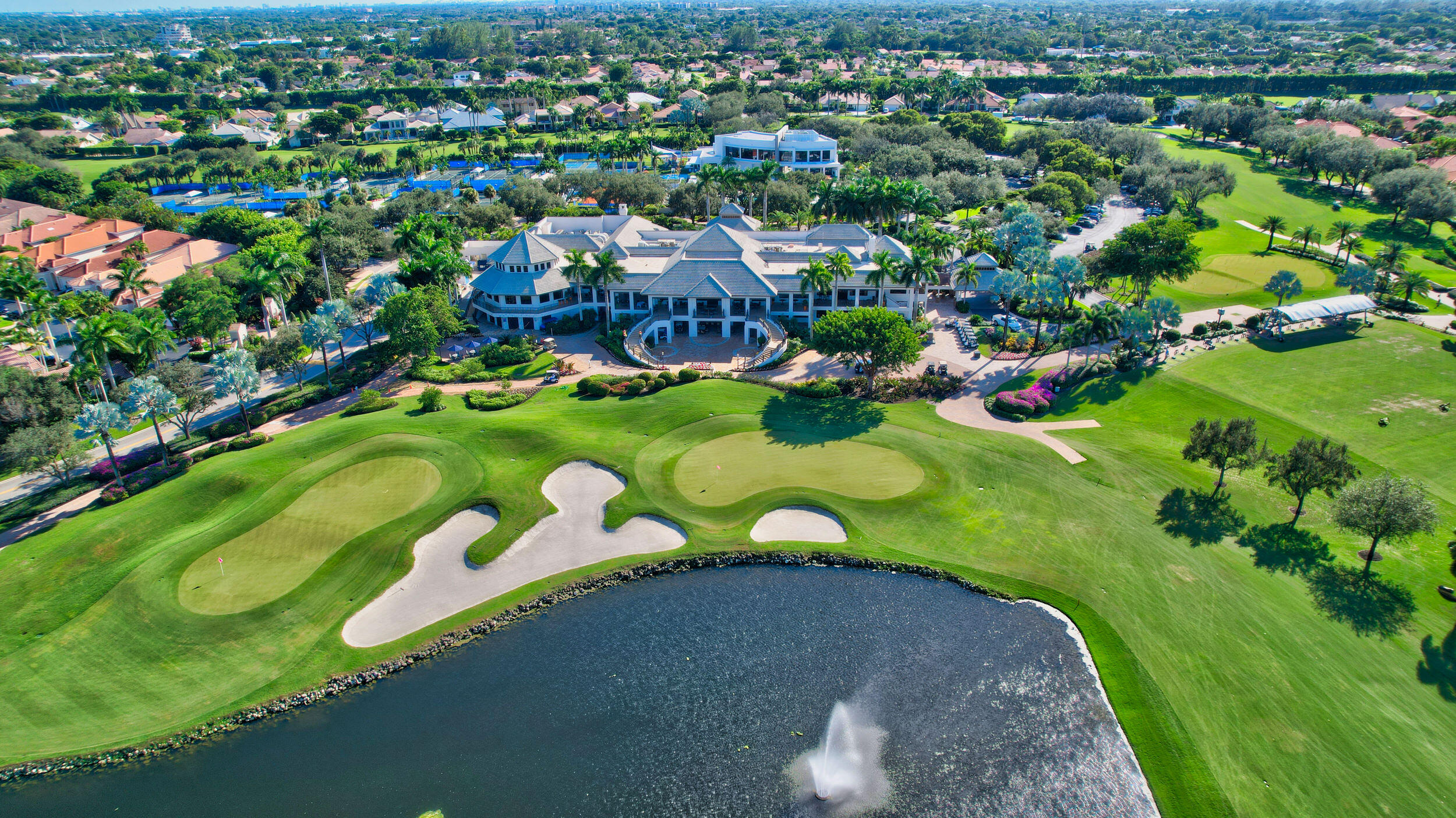 7370 Orangewood Lane, Unit 107 Boca Raton, FL 33433 - Photo 52 of 78 a view of a play ground with a lot of flower plants