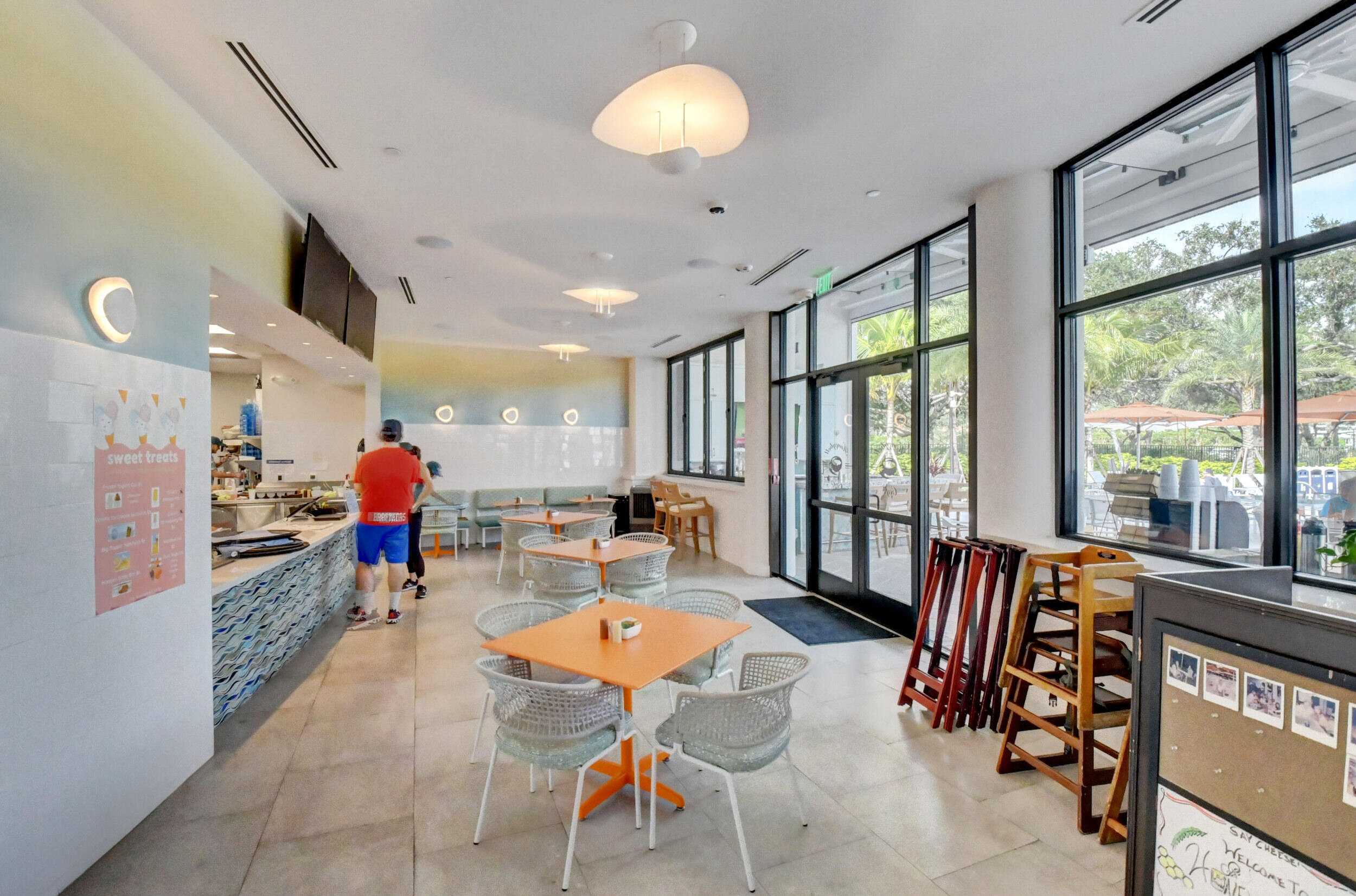7370 Orangewood Lane, Unit 107 Boca Raton, FL 33433 - Photo 73 of 78 a living room with furniture and a large window