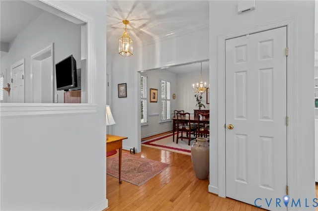 a view of a livingroom with furniture and a flat screen tv