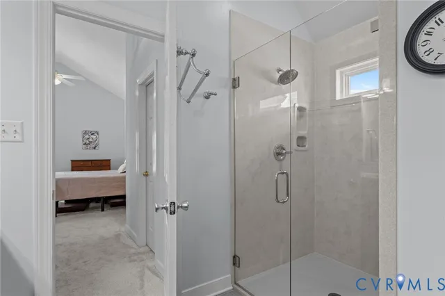 a bathroom with a shower and a toilet