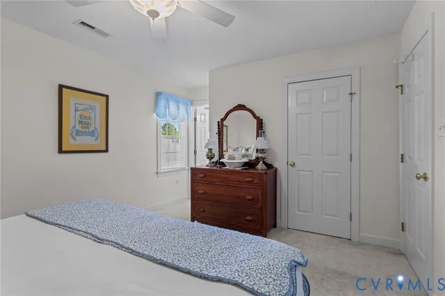 a bathroom with a sink vanity and a mirror