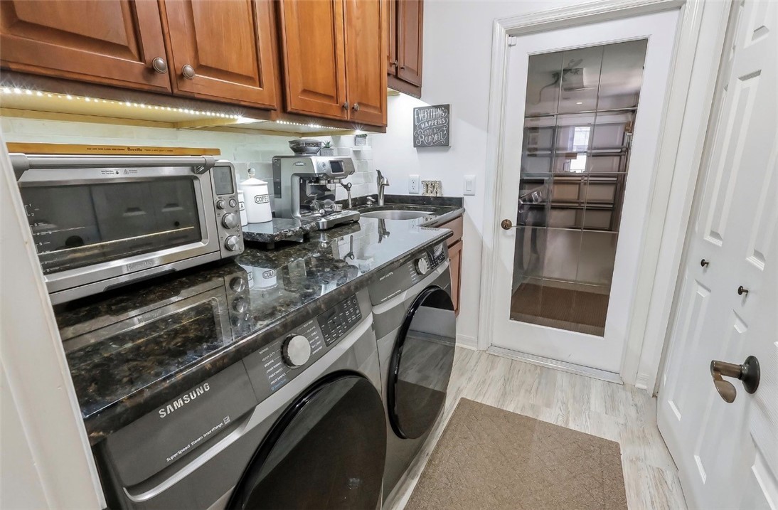 1771 Mistletoe Street Sebastian, FL 32958 - Photo 12 of 36 a kitchen with a stove and a microwave