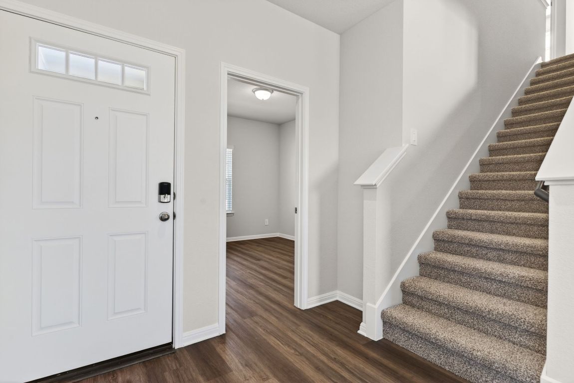 145 Honey Bee Road Jarrell, TX 76537 - Photo 11 of 27 a view of an entryway with wooden floor