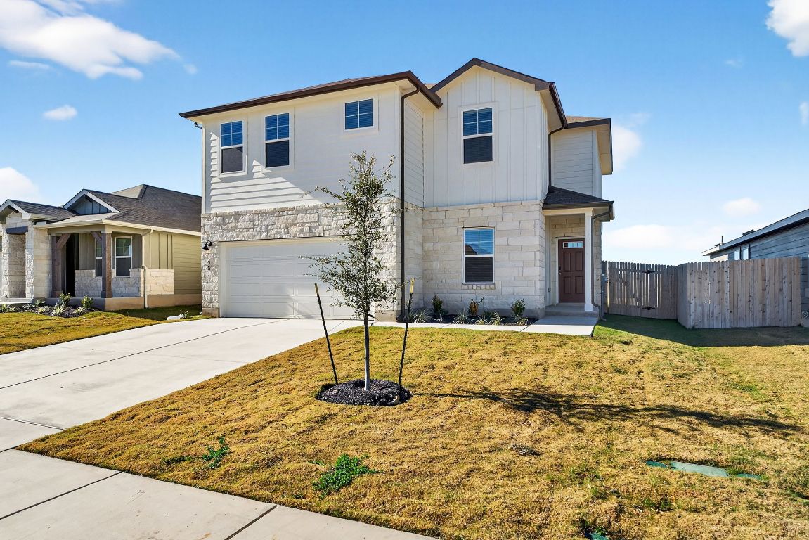 145 Honey Bee Road Jarrell, TX 76537 - Photo 2 of 27 a swimming pool with yard and wooden fence