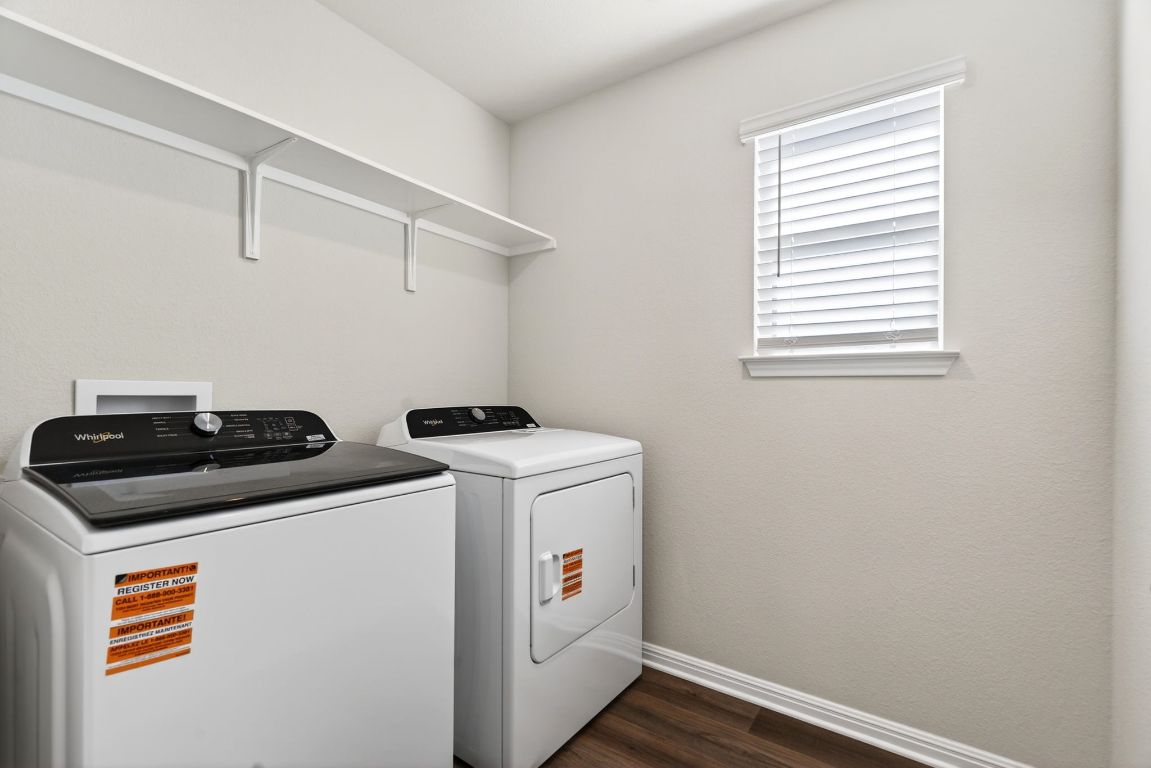 145 Honey Bee Road Jarrell, TX 76537 - Photo 23 of 27 a utility room with dryer and washer
