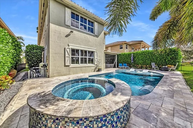 $1,274,990 | 9880 South Miralago Way, Parkland, FL 33076