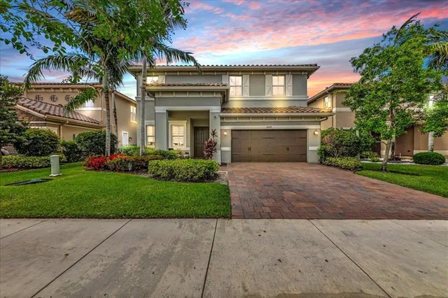 $1,274,990 | 9880 South Miralago Way, Parkland, FL 33076