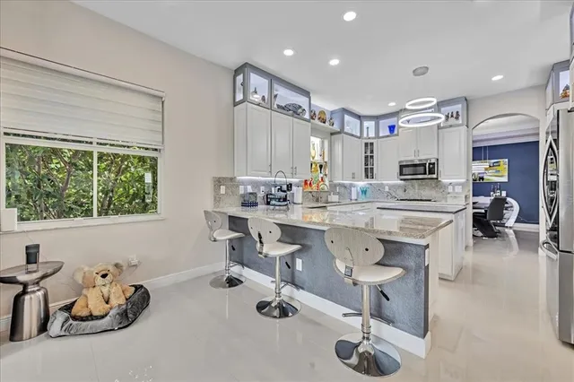$1,274,990 | 9880 South Miralago Way, Parkland, FL 33076