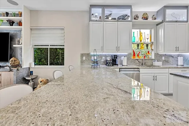$1,274,990 | 9880 South Miralago Way, Parkland, FL 33076
