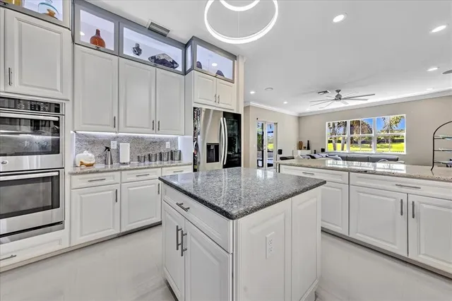 $1,274,990 | 9880 South Miralago Way, Parkland, FL 33076