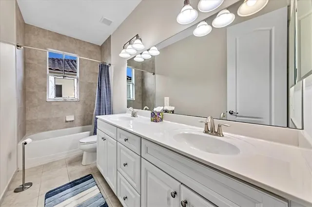 $1,274,990 | 9880 South Miralago Way, Parkland, FL 33076