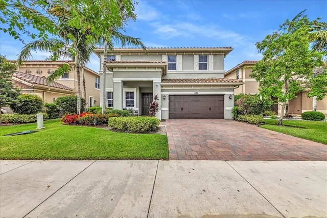 $1,274,990 | 9880 South Miralago Way, Parkland, FL 33076