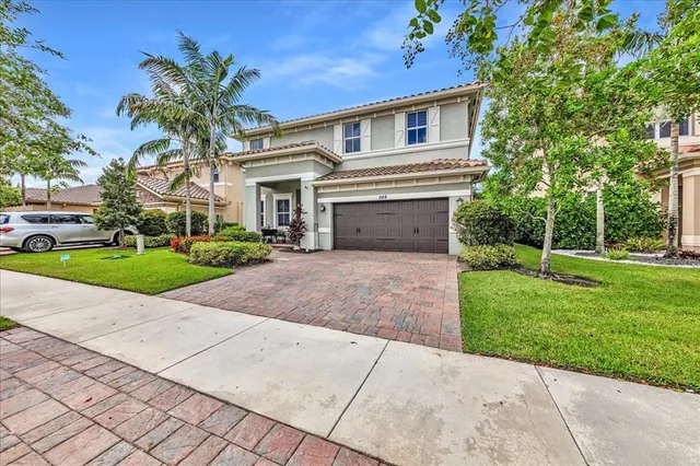 $1,274,990 | 9880 South Miralago Way, Parkland, FL 33076