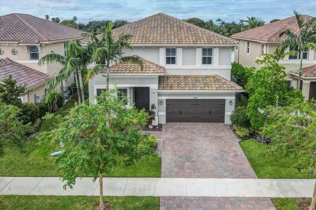 $1,274,990 | 9880 South Miralago Way, Parkland, FL 33076
