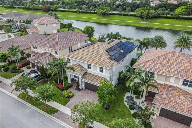 $1,274,990 | 9880 South Miralago Way, Parkland, FL 33076