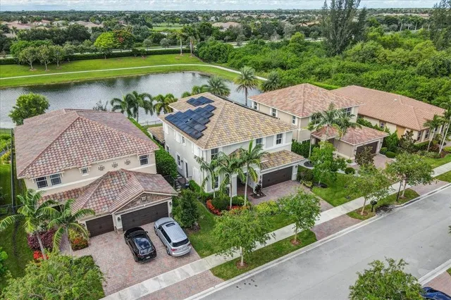 $1,274,990 | 9880 South Miralago Way, Parkland, FL 33076