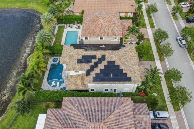 $1,274,990 | 9880 South Miralago Way, Parkland, FL 33076