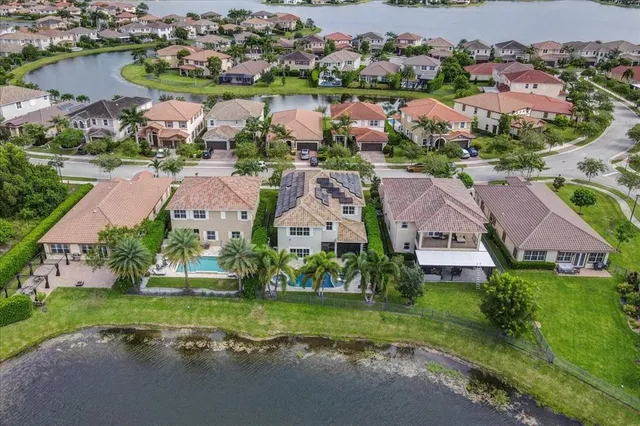 $1,274,990 | 9880 South Miralago Way, Parkland, FL 33076