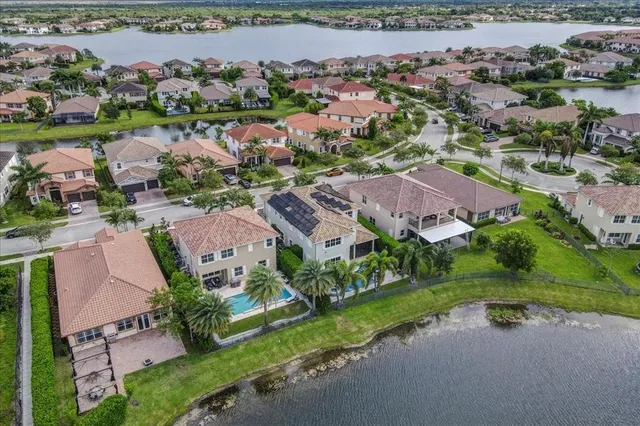 $1,274,990 | 9880 South Miralago Way, Parkland, FL 33076