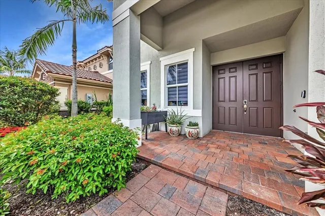 $1,274,990 | 9880 South Miralago Way, Parkland, FL 33076
