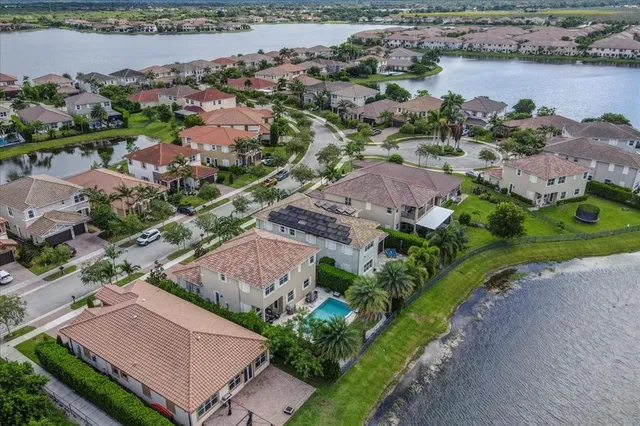 $1,274,990 | 9880 South Miralago Way, Parkland, FL 33076