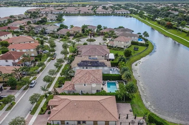 $1,274,990 | 9880 South Miralago Way, Parkland, FL 33076