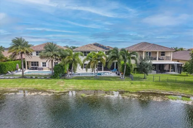 $1,274,990 | 9880 South Miralago Way, Parkland, FL 33076