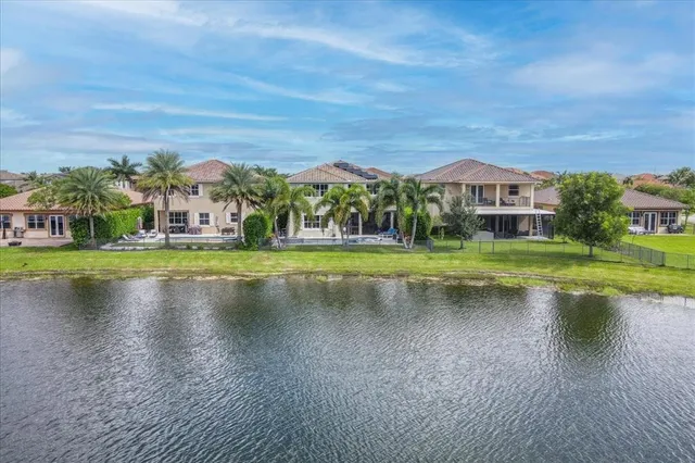 $1,274,990 | 9880 South Miralago Way, Parkland, FL 33076