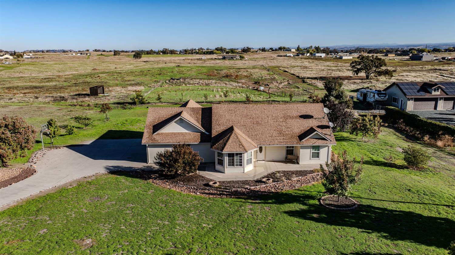 a aerial view of a house with a ocean view